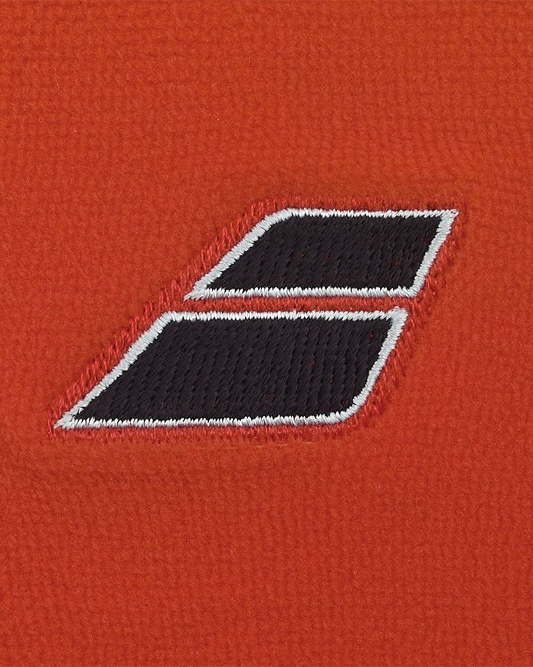 Detail van Babolat Terry Jumbo polsbandjes oranje badstofmateriaal en logo
