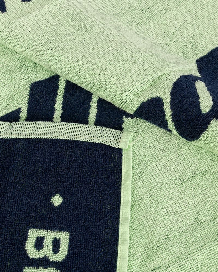 Detail van de stof van de Bullpadel BPTOWEL26 150x90 acid green handdoek