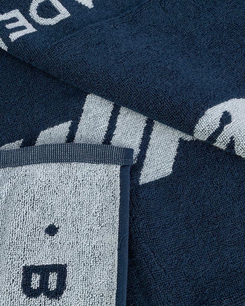Detail van de zachte stof van de Bullpadel BPTOWEL26 150x90 navy blue handdoek